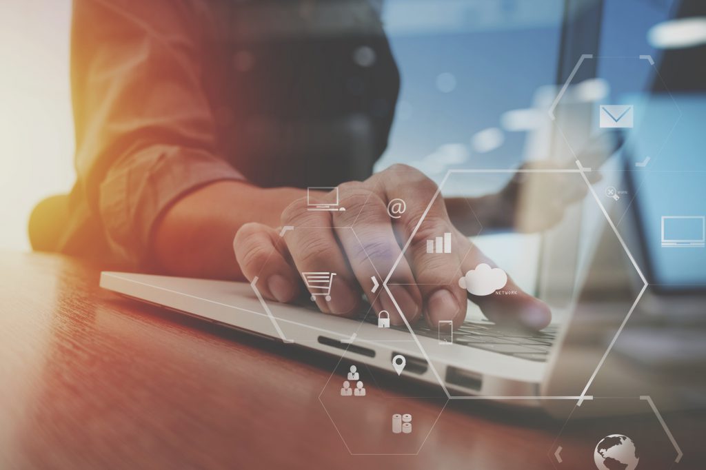 Businessman working with mobile phone and digital tablet and lap
